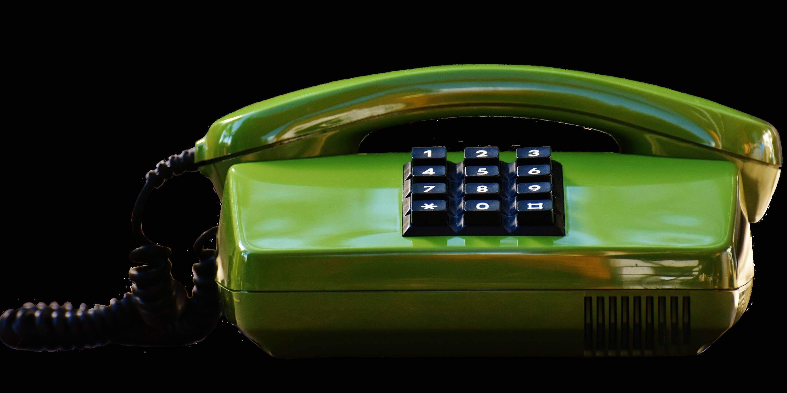 grön trådtelefon.